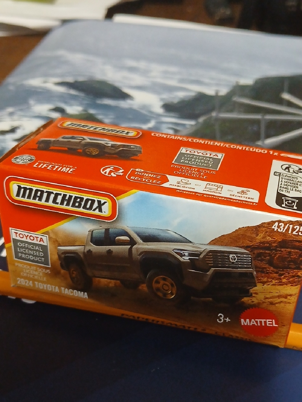 Matchbox Match 2024 Toyota Tacoma Toy Truck in Orange and Gray Box